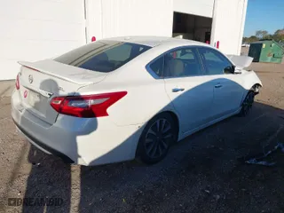 2016 Nissan Altima 2.5 S with VIN 1N4AL3APXGC142878, listed as a IAAI auction lot 40640070 with 149,229 mi miles. Bid and sale history available at carsss.com. Image 4.