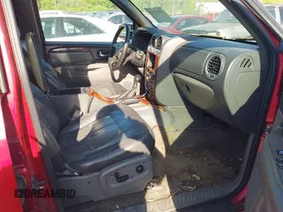 2004 GMC Envoy SLT with VIN 1GKDT13S342150579, listed as a IAAI auction lot 42055124 with 233,090 mi miles and . Bid and sale history available at DreamBid. Image 5.