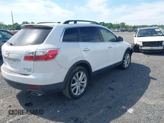 2012 Mazda CX-9 Grand Touring z VIN JM3TB3DV3C0334050, wystawiony jako IAAI lot #42295496 z przebiegiem 172 973 mil mil oraz . Historia ofert i sprzedaży dostępna na DreamBid. Obrazek 4.