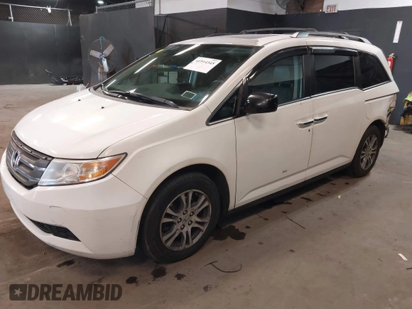 2013 Honda Odyssey EX-L with VIN 5FNRL5H66DB071151, listed as a IAAI auction lot 41914345 with 194,804 mi miles and . Bid and sale history available at carsss.com. Image 17.