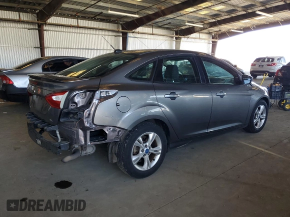 2012 Ford Focus SE with VIN 1FAHP3F28CL114572, listed as a Copart auction lot 63053035 with 142,994 mi miles and Salvage title. Bid and sale history available at DreamBid. Image 3.