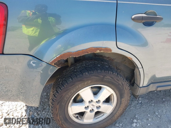 2012 Ford Escape XLT with VIN 1FMCU0D73CKB57521, listed as a IAAI auction lot 42380937 with 155,558 mi miles and . Bid and sale history available at DreamBid. Image 13.
