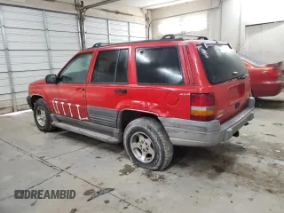 1997 Jeep Grand Cherokee Laredo with VIN 1J4GZ58Y9VC629994, listed as a Copart auction lot 83086694 with 252,147 mi miles and Salvage Title. Bid and sale history available at carsss.com. Image 2.