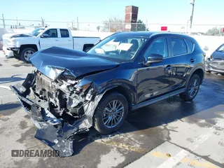 2019 Mazda CX-5 Touring with VIN JM3KFACM7K1534905, listed as a IAAI auction lot 41945607 with 56,014 mi miles. Bid and sale history available at carsss.com. Image 19.
