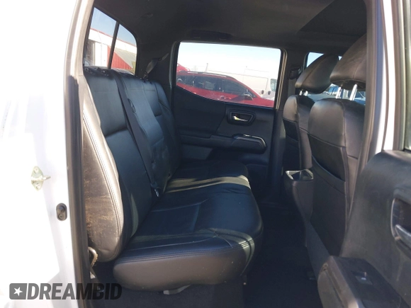 2017 Toyota Tacoma SR5 with VIN 3TMDZ5BN3HM023813, listed as a IAAI auction lot 41522828 with 128,533 mi miles and . Bid and sale history available at DreamBid. Image 8.