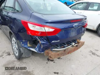 2012 Ford Focus SE with VIN 1FAHP3F21CL163449, listed as a IAAI auction lot 42296901 with 229,857 mi miles and . Bid and sale history available at DreamBid. Image 6.