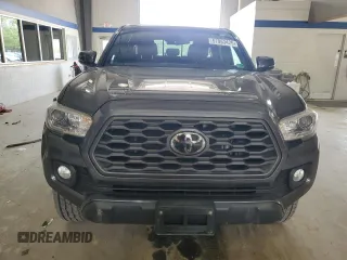 2021 Toyota Tacoma SR with VIN 3TMCZ5ANXMM425903, listed as a Copart auction lot 57963425 with 61,458 mi miles and Salvage title. Bid and sale history available at DreamBid. Image 5.