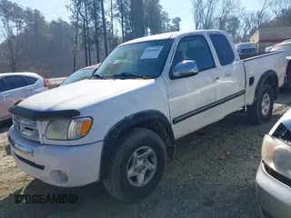 2003 Toyota Tundra SR5 with VIN 5TBBT44133S360948, listed as a IAAI auction lot 41660040 with 213,974 mi miles and . Bid and sale history available at DreamBid. Image 2.