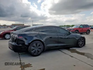2022 Tesla Model S с VIN 5YJSA1E50NF492117, выставлен на аукционе Copart как лот 54307855 с пробегом 42 940 миль миль и Списание • Salvage title. История ставок и продаж доступна на DreamBid. Изображение 3.