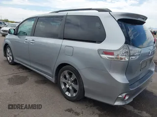 2014 Toyota Sienna SE with VIN 5TDXK3DC4ES491269, listed as a IAAI auction lot 42004485 with 118,516 mi miles and . Bid and sale history available at DreamBid. Image 3.
