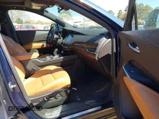 2019 Cadillac XT4 FWD Premium Luxury z VIN 1GYFZCR47KF109394, wystawiony jako IAAI lot #41864606 z przebiegiem 98 425 mil mil oraz . Historia ofert i sprzedaży dostępna na DreamBid. Obrazek 5.