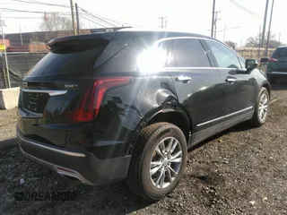 2022 Cadillac XT5 AWD Premium Luxury with VIN 1GYKNDR4XNZ164098, listed as a IAAI auction lot 41822372 with 32,644 mi miles and . Bid and sale history available at DreamBid. Image 4.