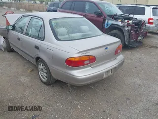 1999 Chevrolet Prizm z VIN 1Y1SK5280XZ445777, wystawiony jako IAAI lot #42138329 z przebiegiem 228 719 mil mil oraz . Historia ofert i sprzedaży dostępna na DreamBid. Obrazek 3.
