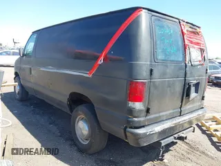 1995 Ford Econoline Cargo with VIN 1FTJE34HXSHC04459, listed as a IAAI auction lot 41927514 with 145,683 mi miles and . Bid and sale history available at DreamBid. Image 3.