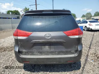 2012 Toyota Sienna XLE AAS with VIN 5TDYK3DC3CS237344, listed as a Copart auction lot 63271815 with 105,860 mi miles and Salvage title. Bid and sale history available at DreamBid. Image 6.