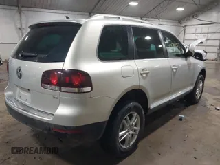 2010 Volkswagen Touareg VR6 with VIN WVGBF7A93AD004398, listed as a IAAI auction lot 41470257 with 108,181 mi miles and . Bid and sale history available at DreamBid. Image 4.