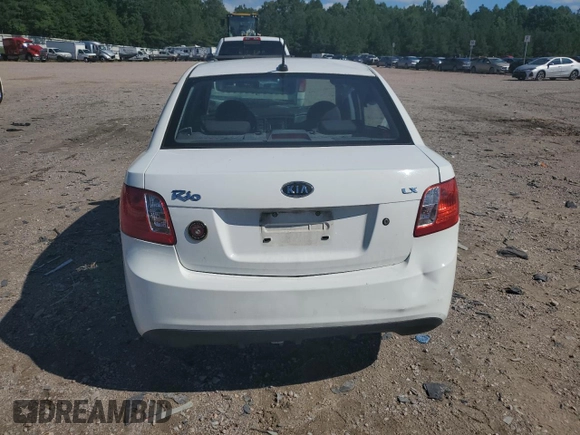 2010 Kia Rio LX with VIN KNADH4A31A6635895, listed as a Copart auction lot 61308434 with 209,016 mi miles and Salvage Title. Bid and sale history available at carsss.com. Image 6.