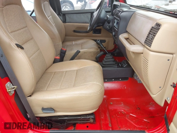 1999 Jeep Wrangler SE z VIN 1J4FY29P5XP487111, wystawiony jako IAAI lot #42125867 z przebiegiem 156 804 mil mil oraz . Historia ofert i sprzedaży dostępna na DreamBid. Obrazek 5.