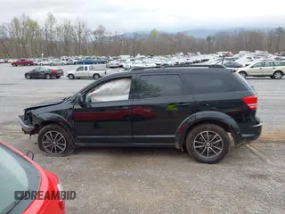 2018 Dodge Journey SE with VIN 3C4PDCAB8JT448530, listed as a IAAI auction lot 41942261 with 86,055 mi miles and . Bid and sale history available at carsss.com. Image 14.
