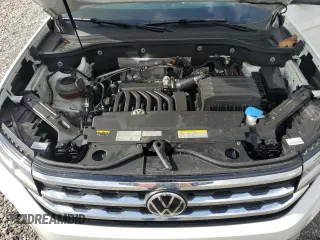 2023 Volkswagen Atlas SE with VIN 1V2KR2CA2PC524739, listed as a Copart auction lot 56976715 with 58,736 mi miles and Salvage title. Bid and sale history available at DreamBid. Image 11.