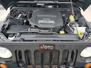2014 Jeep Wrangler Unlimited Rubicon X with VIN 1C4HJWFG0EL142071, listed as a Copart auction lot 56187575 with 110,597 mi miles and Salvage title. Bid and sale history available at DreamBid. Image 12.