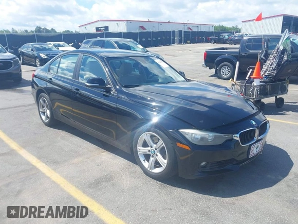 2013 BMW 3 Series 328i xDrive with VIN WBA3B5C58DF138736, listed as a IAAI auction lot 41981208 with 113,510 mi miles. Bid and sale history available at carsss.com. Image 1.