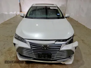 2021 Toyota Avalon XLE z VIN 4T1AZ1FB0MU060010, wystawiony jako Copart lot #56844085 z przebiegiem 115 788 mil mil oraz Czysty tytuł • Clean title. Historia ofert i sprzedaży dostępna na DreamBid. Obrazek 5.
