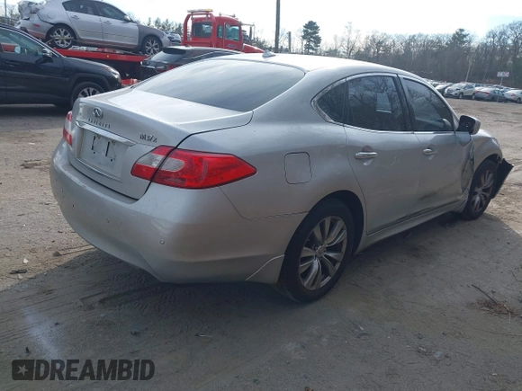 2013 Infiniti M z VIN JN1BY1AR0DM600278, wystawiony jako IAAI lot #41303485 z przebiegiem 298 943 mil mil oraz . Historia ofert i sprzedaży dostępna na DreamBid. Obrazek 4.