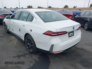 2024 BMW i5 eDrive40 with VIN WBY33FK03RCR99079, listed as a IAAI auction lot 42028540 with 28,827 mi miles and . Bid and sale history available at DreamBid. Image 3.