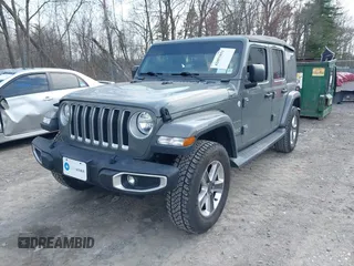 2018 Jeep Wrangler Unlimited Sahara z VIN 1C4HJXEN8JW329816, wystawiony jako IAAI lot #42055851 z przebiegiem 70 298 mil mil oraz . Historia ofert i sprzedaży dostępna na DreamBid. Obrazek 6.