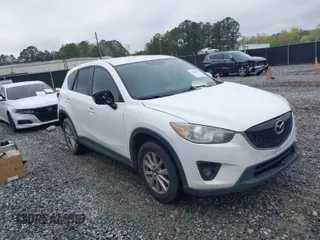 2015 Mazda CX-5 Touring with VIN JM3KE2CY4F0436664, listed as a IAAI auction lot 41876238 with 374,305 mi miles. Bid and sale history available at carsss.com. Image 1.
