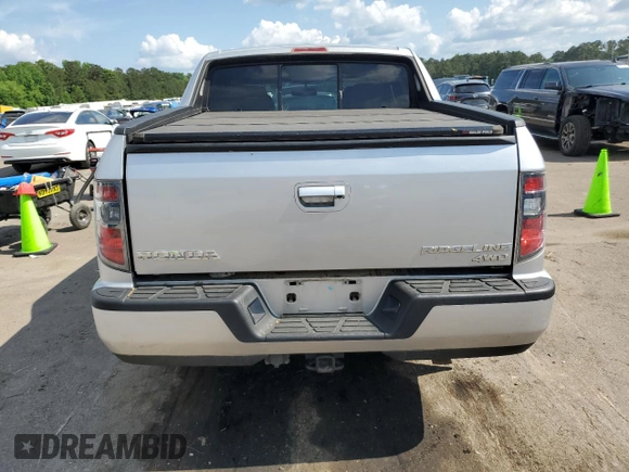 2014 Honda Ridgeline RTL with VIN 5FPYK1F57EB002835, listed as a Copart auction lot 54748905 with 111,253 mi miles and Salvage title. Bid and sale history available at DreamBid. Image 6.