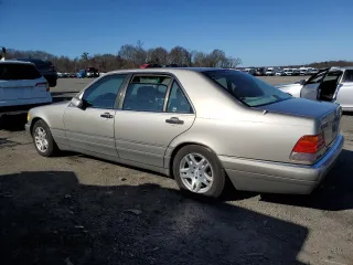 1995 Mercedes-Benz S with VIN WDBGA51E3SA273738, listed as a Copart auction lot 49763925 with 148,066 mi miles and Clean Title. Bid and sale history available at DreamBid. Image 2.