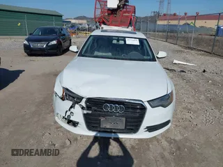 2015 Audi A6 Premium Plus z VIN WAUGFAFC4FN016103, wystawiony jako IAAI lot #41774479 z przebiegiem 125 412 mil mil oraz . Historia ofert i sprzedaży dostępna na DreamBid. Obrazek 13.