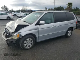 2004 Honda Odyssey EX-L with VIN 5FNRL18794B010703, listed as a Copart auction lot 43355265 with 167,351 mi miles and Salvage title. Bid and sale history available at DreamBid. Image 1.