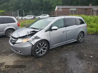 2016 Honda Odyssey Touring Elite z VIN 5FNRL5H95GB106003, wystawiony jako Copart lot #60817865 z przebiegiem 105 812 mil mil oraz Szkoda całkowita • Salvage title. Historia ofert i sprzedaży dostępna na DreamBid. Obrazek 1.
