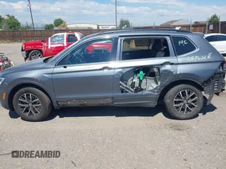 2019 Volkswagen Tiguan SE with VIN 3VV2B7AX3KM143968, listed as a IAAI auction lot 39838788 with 155,823 mi miles and . Bid and sale history available at DreamBid. Image 14.
