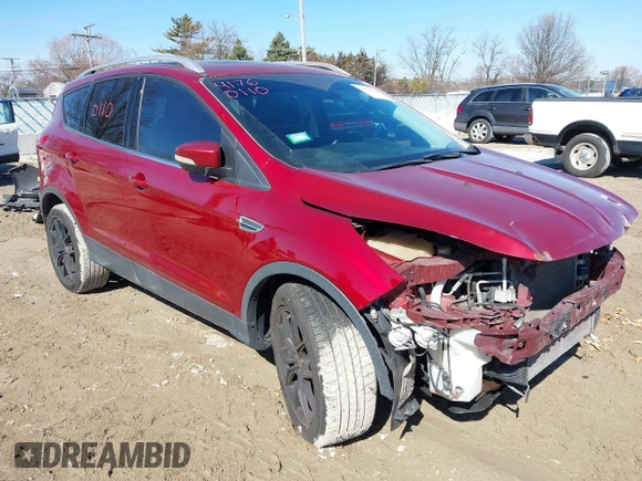 2016 Ford Escape Titanium with VIN 1FMCU9J98GUB42453, listed as a IAAI auction lot 41760110 with 116,452 mi miles. Bid and sale history available at carsss.com. Image 1.