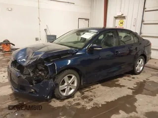 2012 Volkswagen Jetta Sedan TDI with VIN 3VW3L7AJ8CM378733, listed as a IAAI auction lot 41571197 with 151,159 mi miles. Bid and sale history available at carsss.com. Image 17.