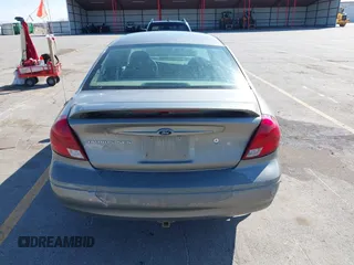 2003 Ford Taurus SES Standard with VIN 1FAFP55283G168564, listed as a IAAI auction lot 41884130 with 199,923 mi miles and . Bid and sale history available at DreamBid. Image 16.