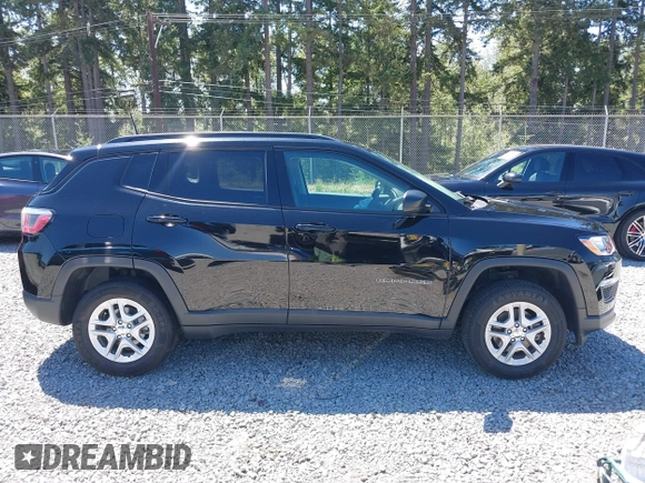 2018 Jeep Compass Sport with VIN 3C4NJDAB1JT261863, listed as a IAAI auction lot 42677037 with 93,263 mi miles and . Bid and sale history available at DreamBid. Image 13.