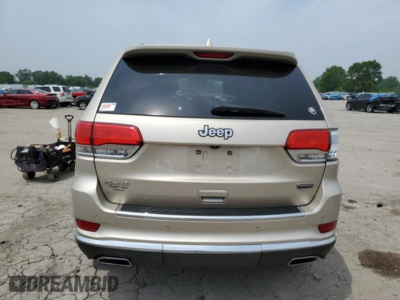 2014 Jeep Grand Cherokee Summit с VIN 1C4RJFJGXEC436797, выставлен на аукционе Copart как лот 60248595 с пробегом 156 395 миль миль и Списание • Salvage title. История ставок и продаж доступна на DreamBid. Изображение 6.