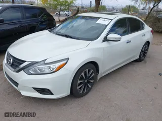 2018 Nissan Altima 2.5 SR with VIN 1N4AL3AP2JC140548, listed as a IAAI auction lot 41968993 with 112,000 mi miles. Bid and sale history available at carsss.com. Image 2.