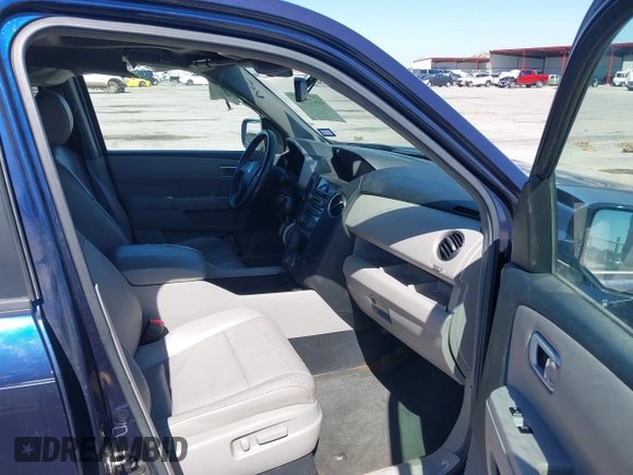 2013 Honda Pilot Touring with VIN 5FNYF3H94DB018384, listed as a IAAI auction lot 41672767 with 188,922 mi miles and . Bid and sale history available at DreamBid. Image 5.