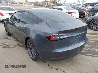 2018 Tesla Model 3 Long Range Battery with VIN 5YJ3E1EA0JF101564, listed as a IAAI auction lot 41902214 with 101,581 mi miles. Bid and sale history available at carsss.com. Image 3.