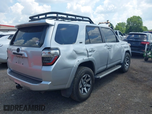 2020 Toyota 4Runner SR5 with VIN JTEBU5JR6L5807164, listed as a IAAI auction lot 42687254 with 127,825 mi miles and . Bid and sale history available at DreamBid. Image 4.