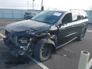 2014 Dodge Durango Limited with VIN 1C4SDHDT2EC405671, listed as a IAAI auction lot 39442398 with 154,469 mi miles and . Bid and sale history available at DreamBid. Image 2.