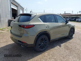 2024 Mazda CX-5 Carbon Edition with VIN JM3KFBAY8R0428460, listed as a IAAI auction lot 41936838 with 11,095 mi miles and . Bid and sale history available at DreamBid. Image 4.