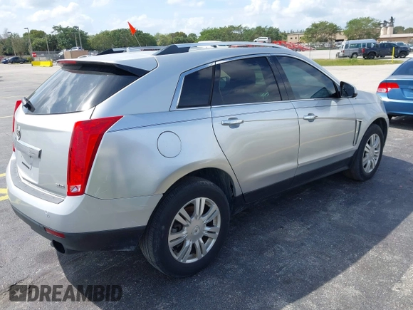 2013 Cadillac SRX Luxury Collection with VIN 3GYFNCE39DS512235, listed as a IAAI auction lot 38873243 with 133,378 mi miles and . Bid and sale history available at DreamBid. Image 4.