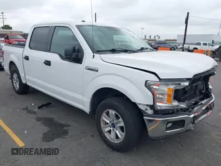 2018 Ford F-150 XL with VIN 1FTEW1CB4JKC87131, listed as a IAAI auction lot 42120579 with 93,143 mi miles. Bid and sale history available at carsss.com. Image 1.